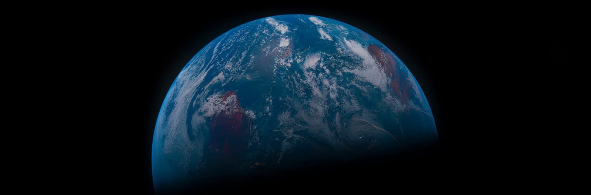 Foto. En la parte superior se ve la mitad de la Tierra vista desde el espacio, la mitad del planeta, la parte inferior, se encuentra en sombra. 