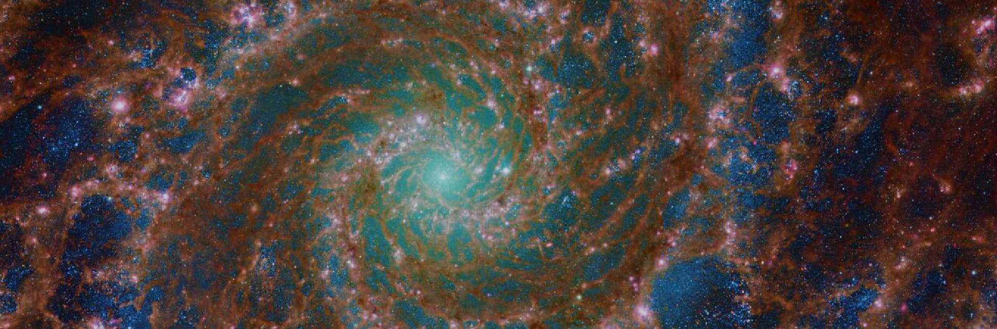Imagen astronómica. Una galaxia espiral con filamentos luminosos y un núcleo brillante.