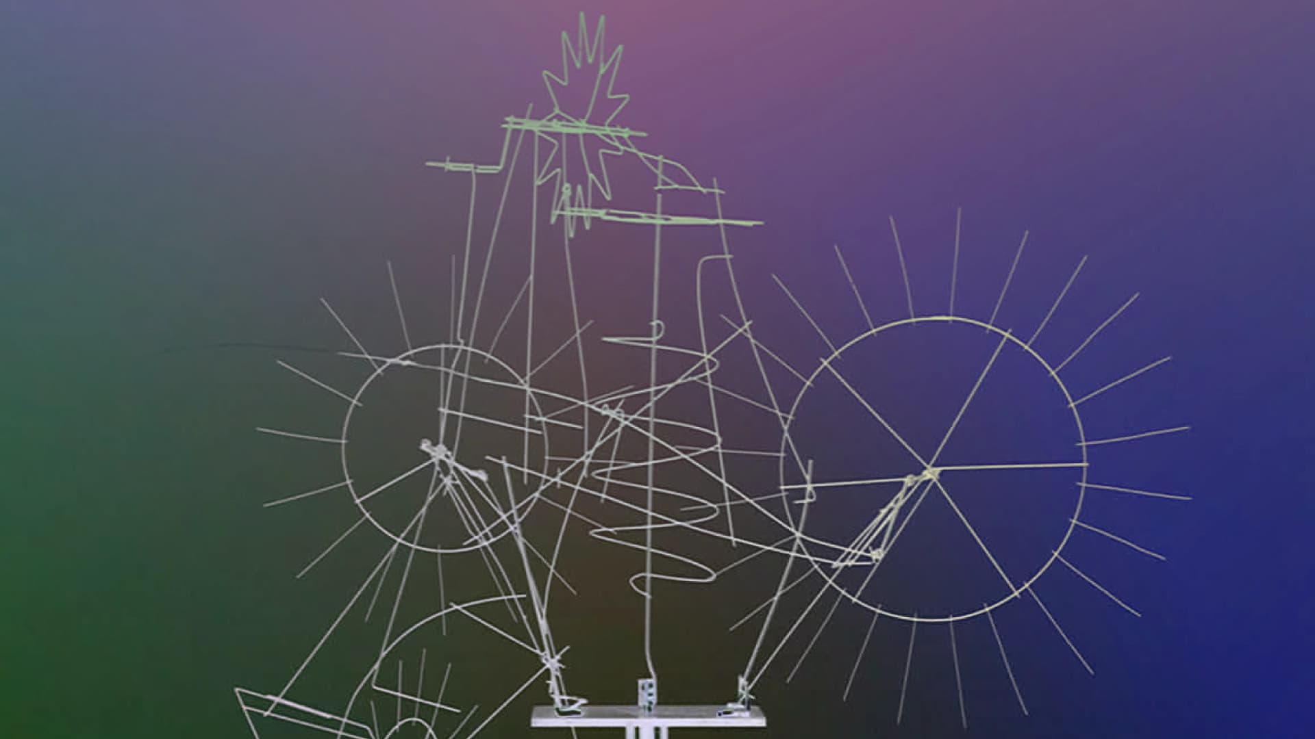 Ilustración. Sobre un fondo con degradado que transita entre tonos verdes, morados y azules, aparece el dibujo lineal de un mecanismo similar a una bicicleta. Se observan dos ruedas circulares a los lados, cada una con líneas radiales que evocan rayos de sol. En el centro hay una estructura vertical compuesta por barras rectas y diagonales, con trazos superpuestos que sugieren movimiento. En la parte superior de la estructura se distingue una figura en forma de estrella o destello. Diversas líneas curvas y rectas conectan las ruedas con el eje central, formando un entramado que recuerda un sistema cinético o solar. En la base se aprecia una plataforma horizontal que sostiene el conjunto.
