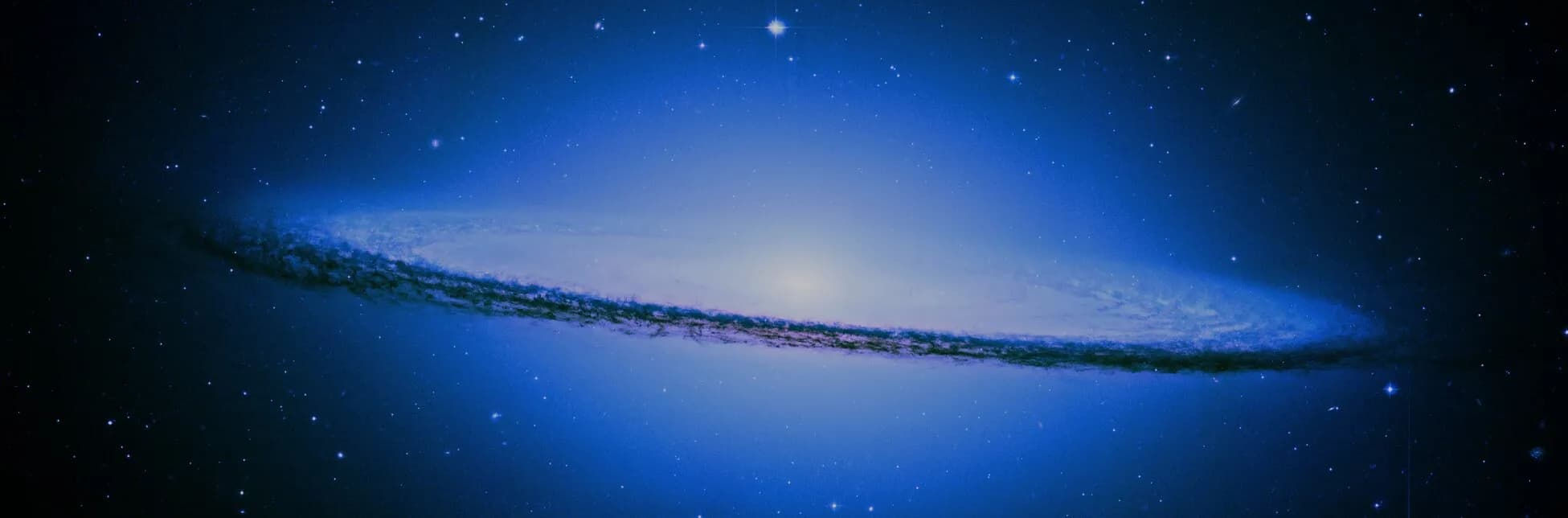 Ilustración de un cielo nocturno con múltiples estrellas y una franja luminosa de galaxia en la parte inferior.